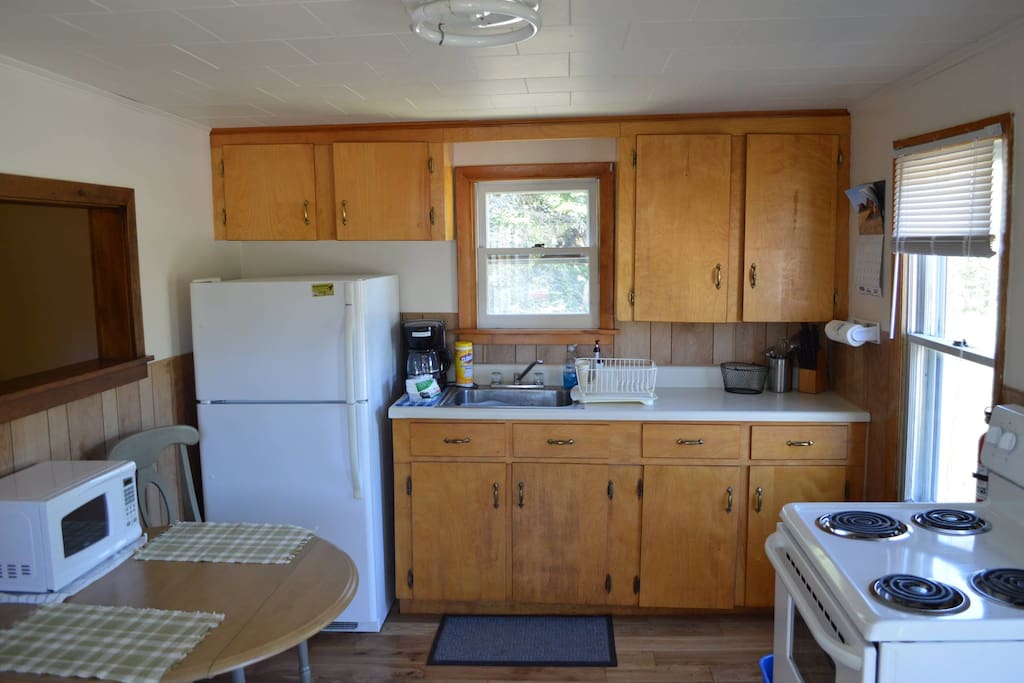 Cozy kitchen with new oak flooring.