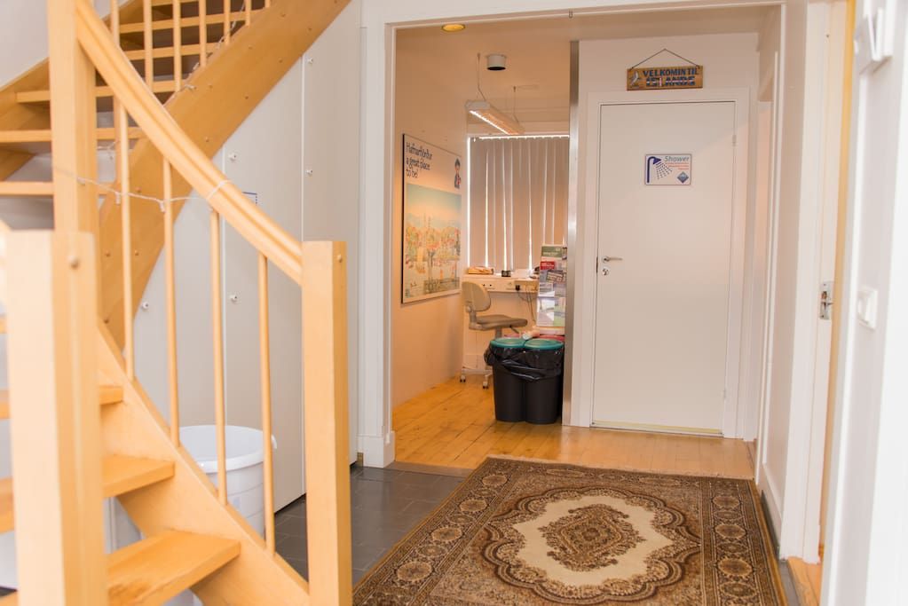 The entrance, the shared bathrooms and shower rooms are downstairs