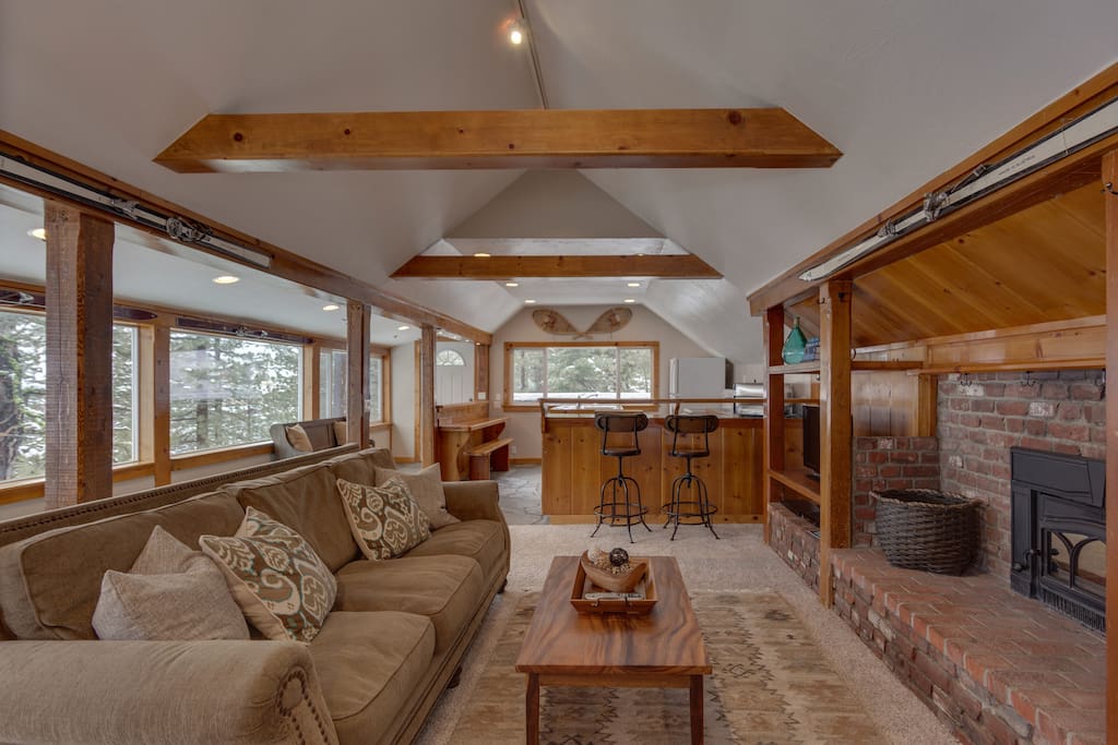 spacious amazingly bright common area with fireplace