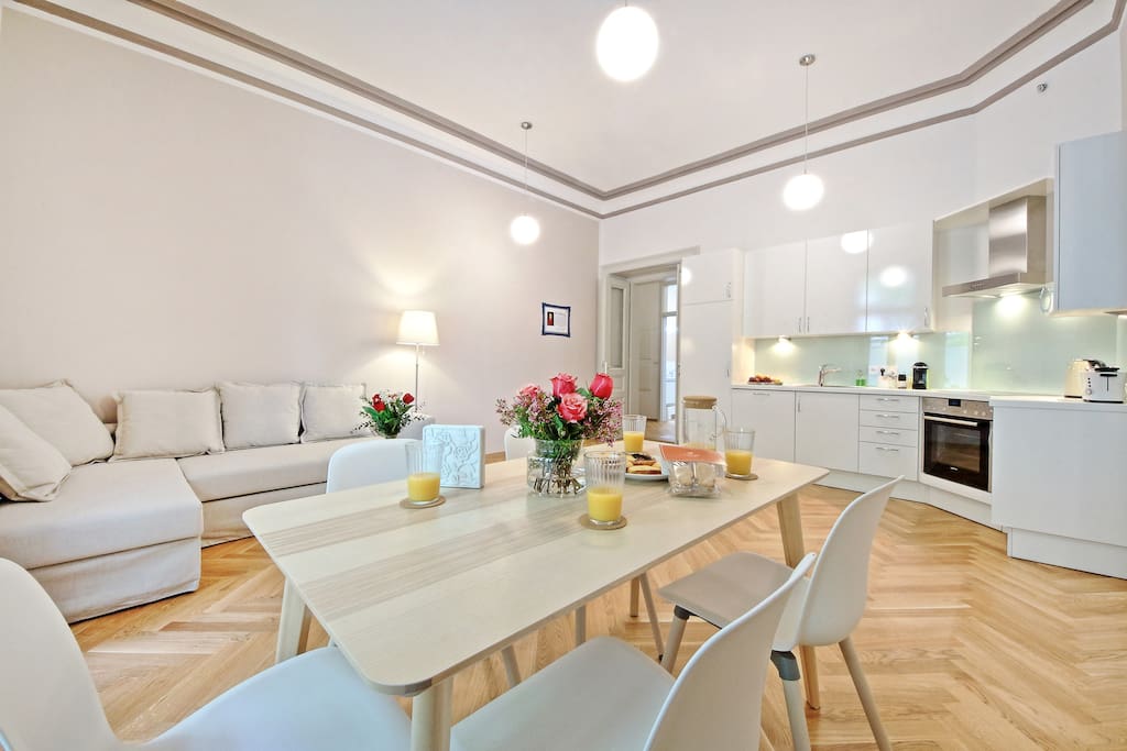 living room with kitchenette and pull out sofa