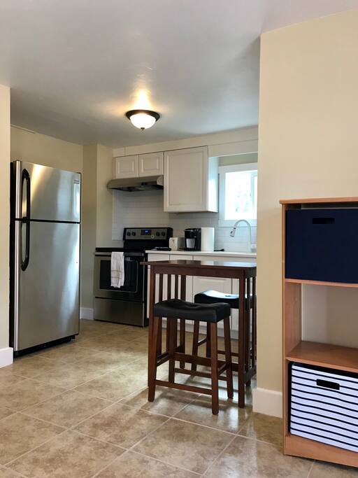 Lots of natural light from the kitchen. Bistro table for 2.