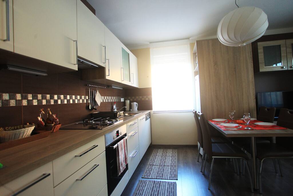A fully stocked kitchen that is perfect for any amateur chef looking to prepare a delicious meal.