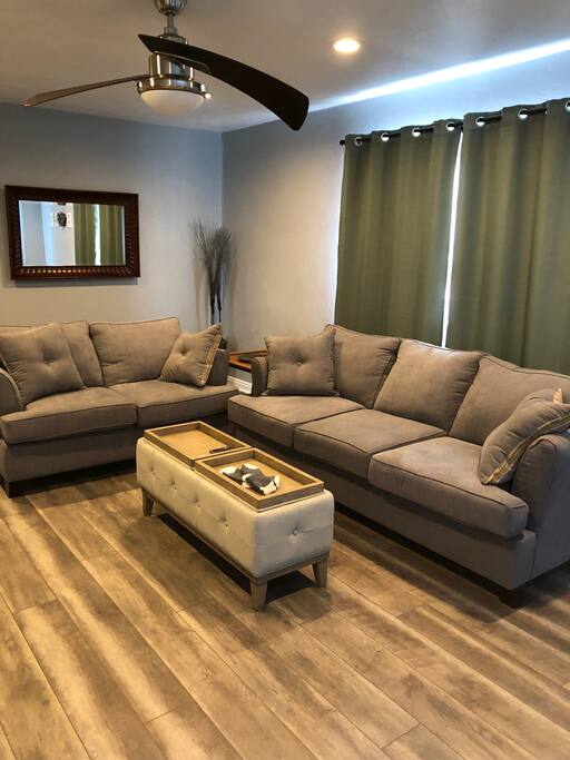 Large living room, flip over the coffee table lids for extra seating