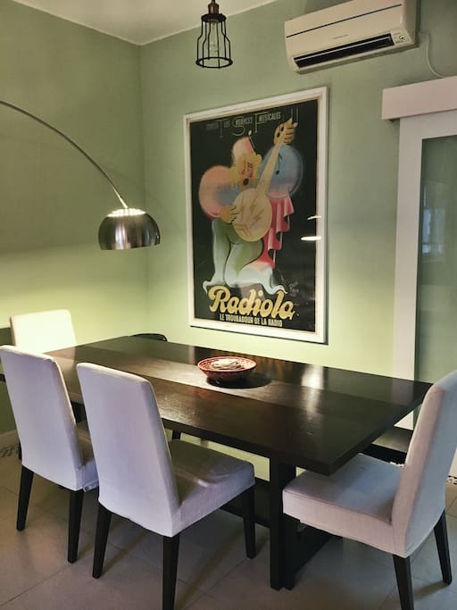 Dining Space Featuring Original Art from France