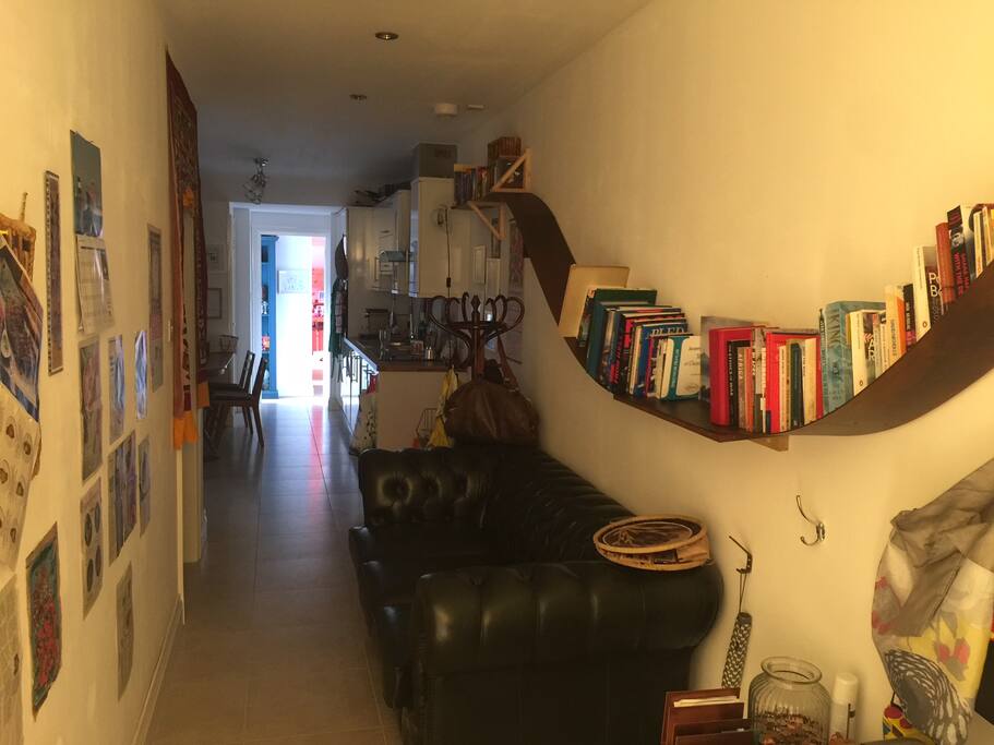 Corridor leading from front door to kitchen (lounge on right).