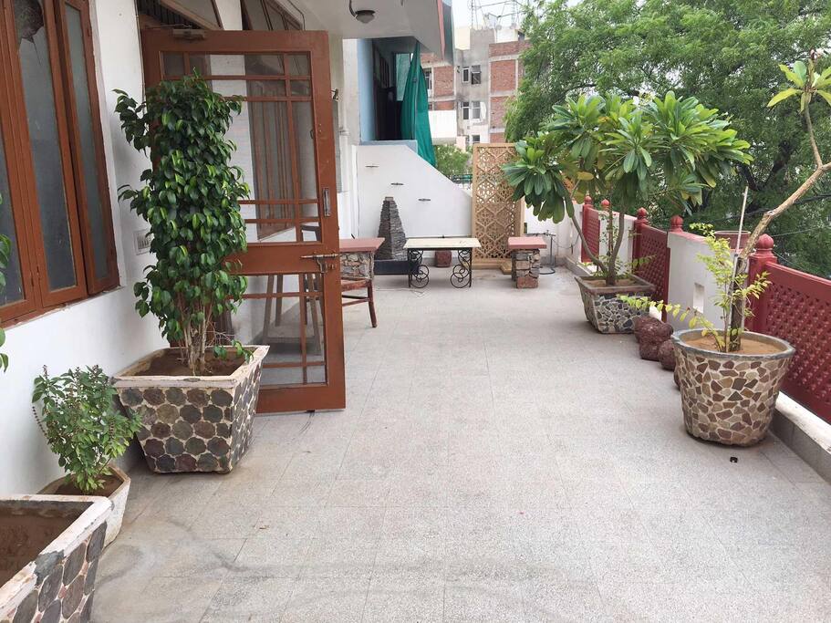 first floor balcony with fountain and sitting