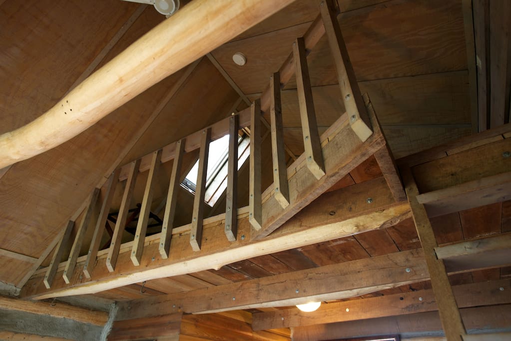 View of loft where bed is located.