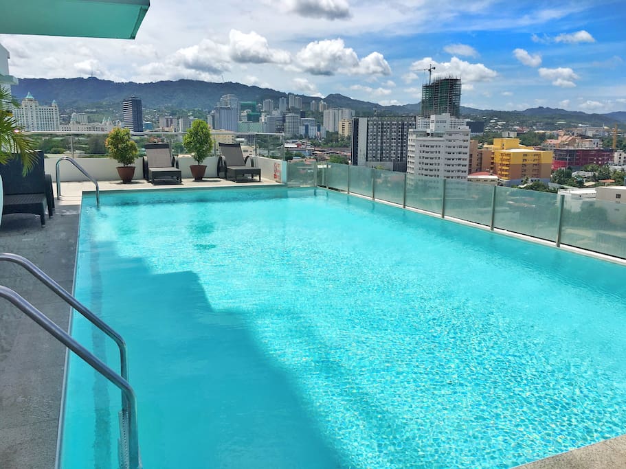 Take a dip in the pool with a relaxing view of the city.
