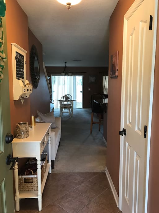 As you walk in through the front door... bathroom is immediately to the left as you walk in. Kitchen to the right.