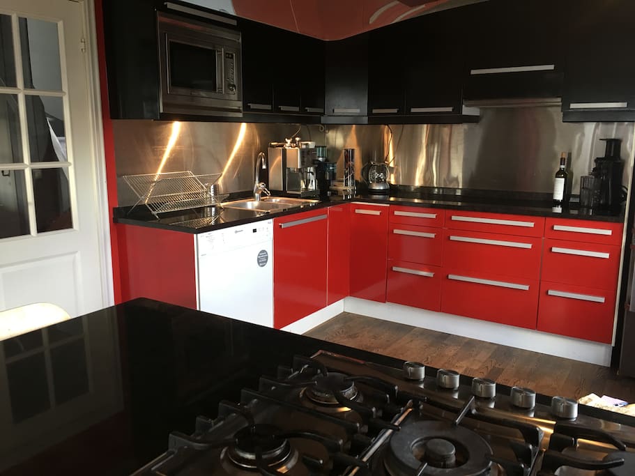 Fully equipped kitchen with gas hob