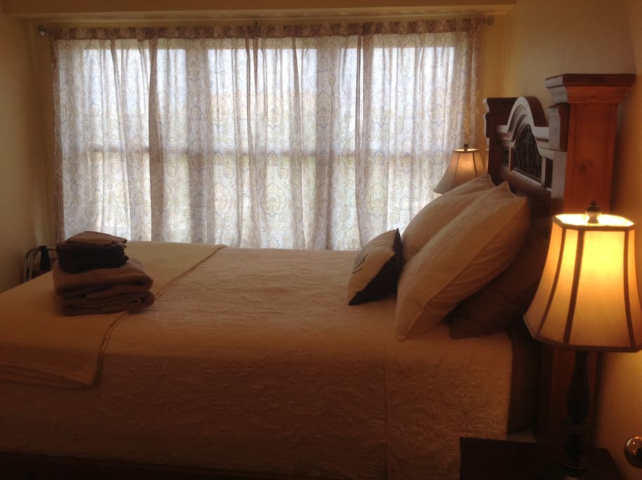 Light & airy queen bedroom