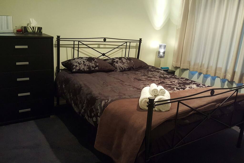 King bed with all bedding and towels