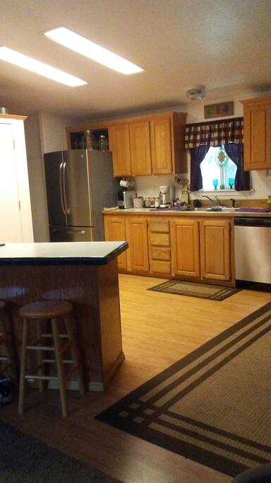 shared kitchen w/ bar stools