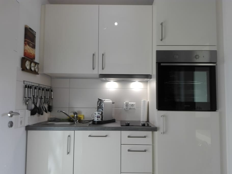 new kitchen with oven, dishwasher, microwave etc.