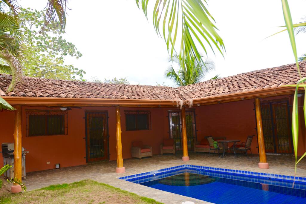 covered patio with pool