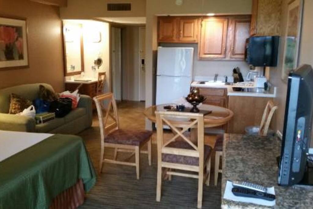 Opposite view of room with kitchenette.