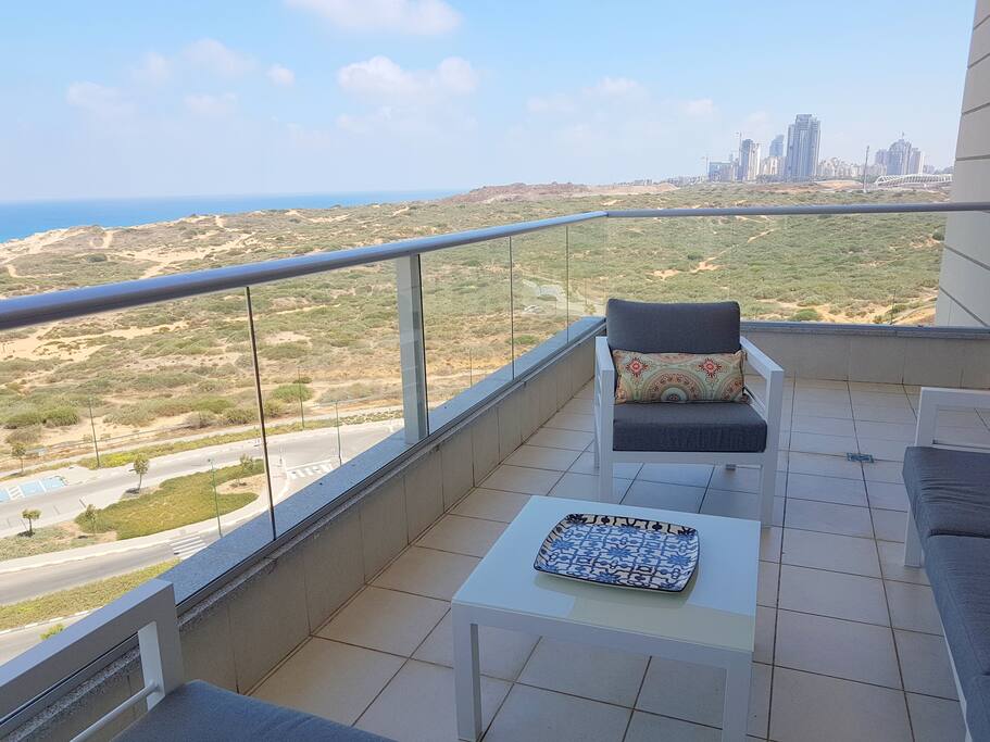 Spacious balcony with views of the nature reserve and Mediterranean Sea