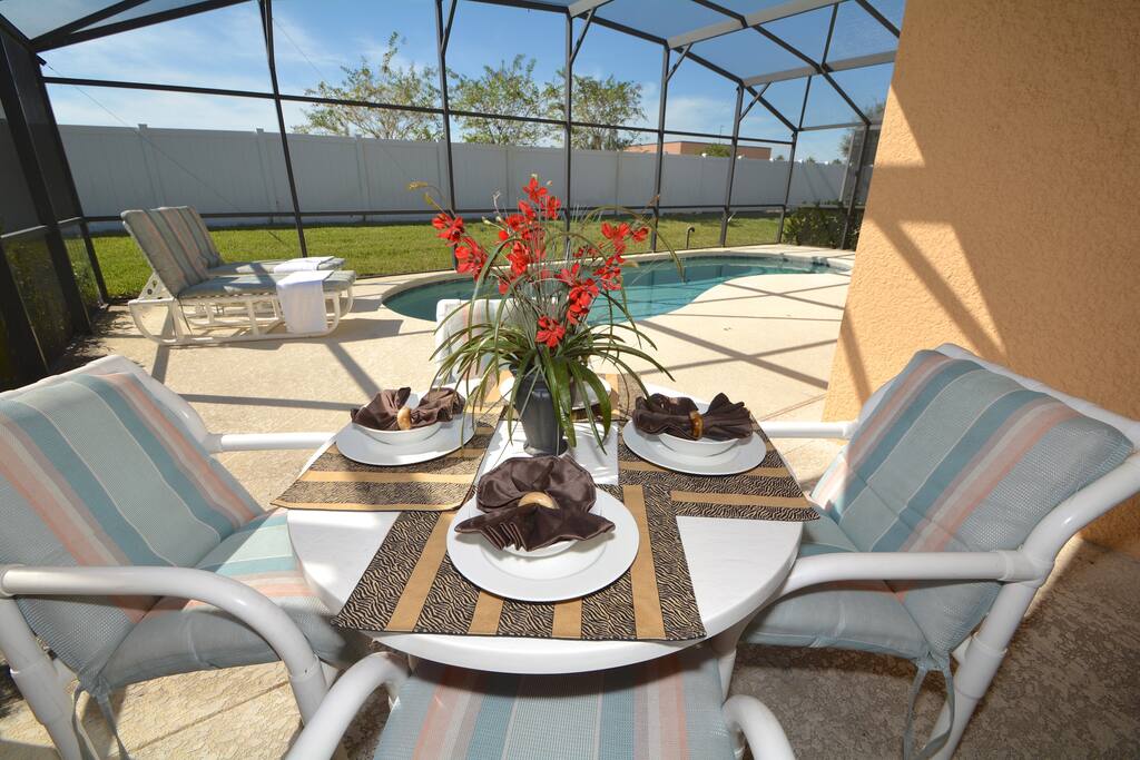 Chair, Furniture, Dining Table, Table, Flower Arrangement