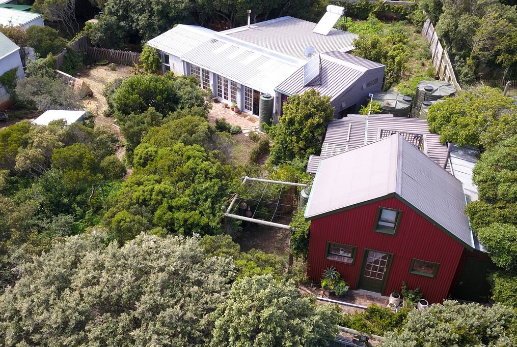 Aerial shot of the whole property, a developing permaculture site practising self-sufficiency.
