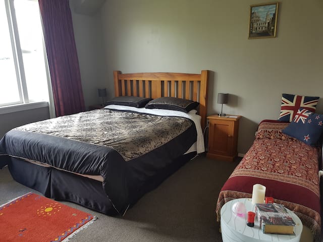 King size bedroom in a lovely home