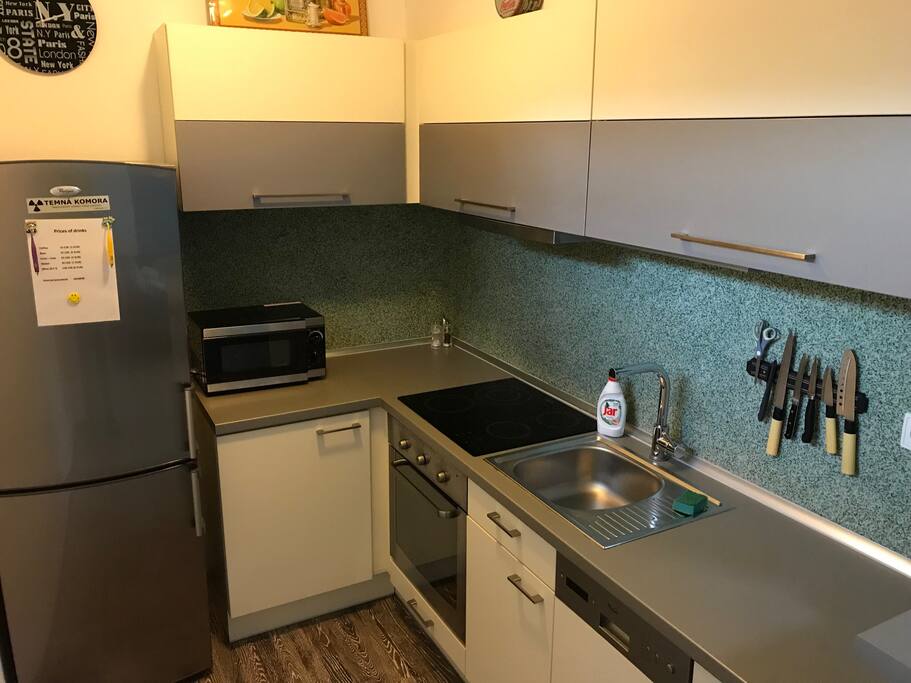 Kitchen corner, dishwasher, own, microwawe own, fridge, freezer, mixer, knifes, cutlery, dishes....just everything.
In a fridge, there is beer, wine, water, coke with price list. Please, leave us money for used thing in the kitchen. We trust our guest:)