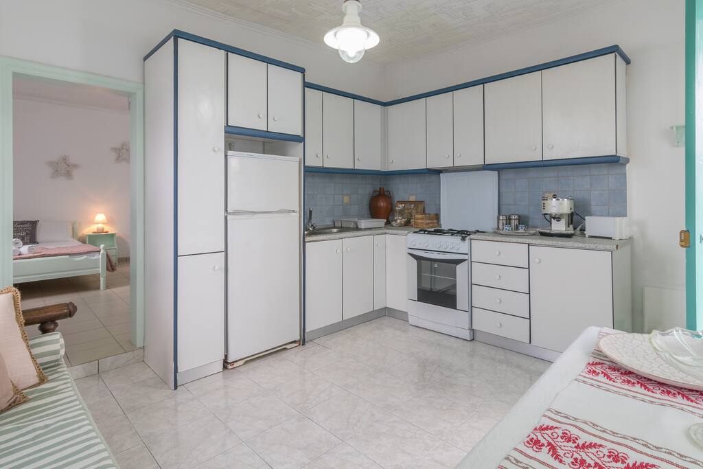 The kitchen is fully equipped, simple but ergonomic.