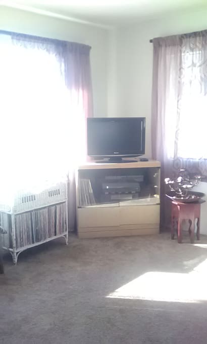 Media Corner
TV with Roku, DVD, Receiver, Plug for streaming your devices, Turntable, Vinyl, CD's in bottom of cabinet