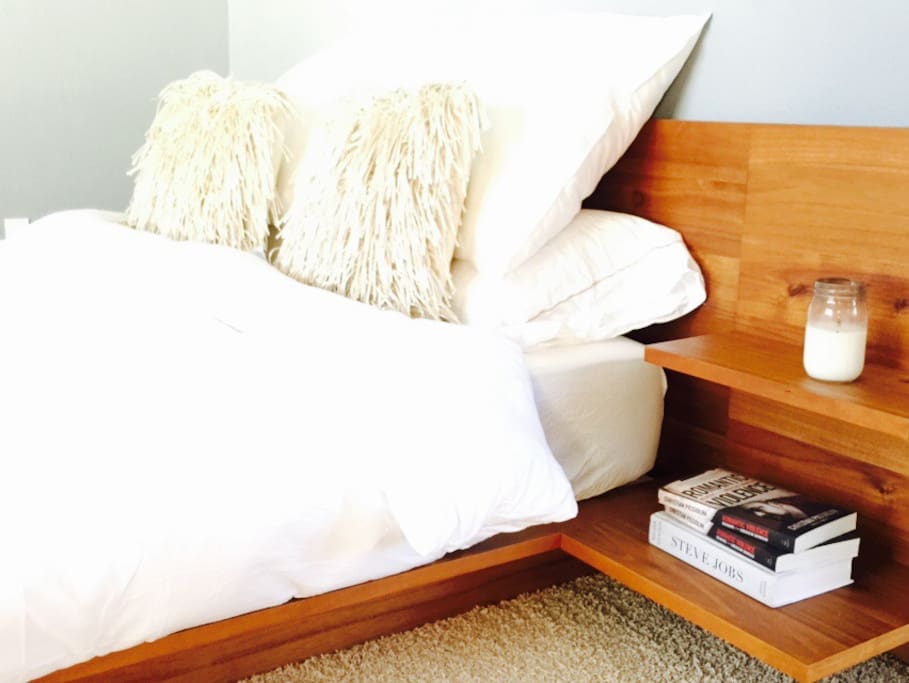 Premium suite has Egyptian cotton linens and elegant walnut bed frame with Casper mattress.