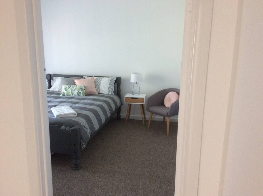 Back bedroom with queen bed.