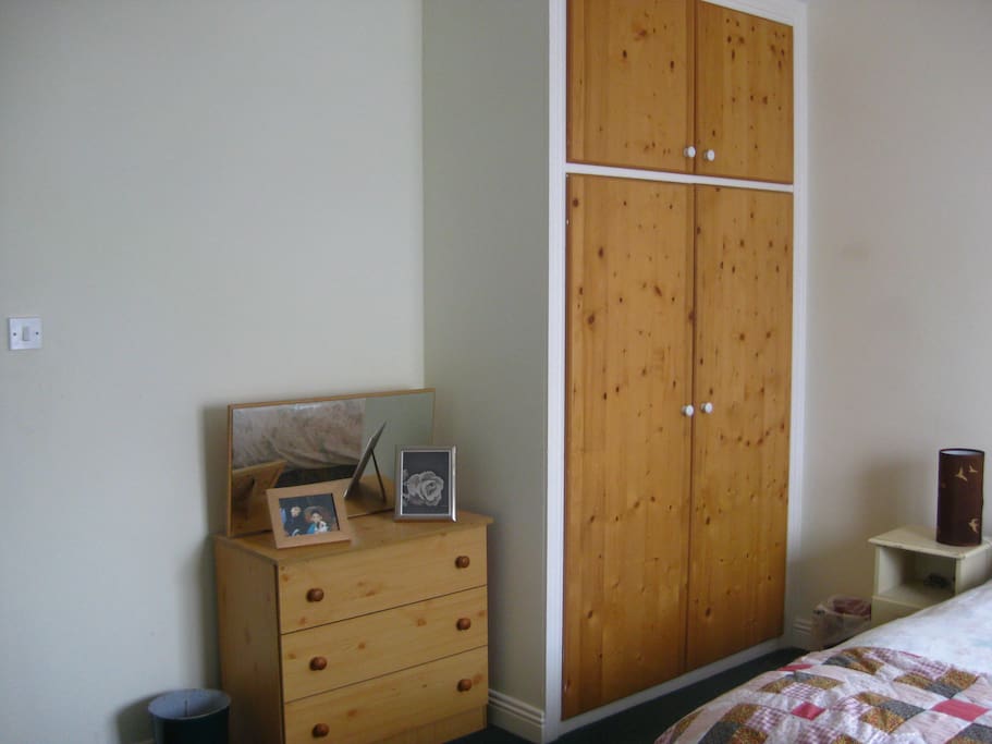 With wardrobe and drawers.