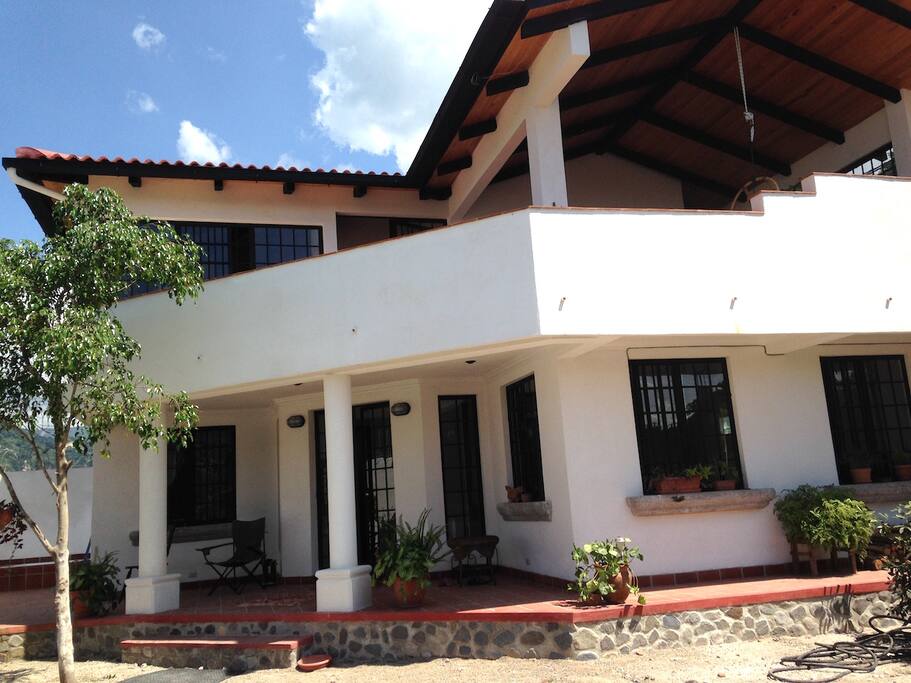 Two bedrooms, 1.5 baths downstairs and living area, including covered terrace, upstairs.
