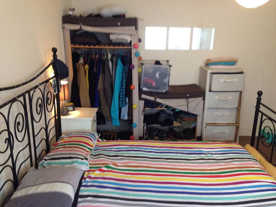 Master room. features wardrobes, chest of drawers, bed tables and lighting.