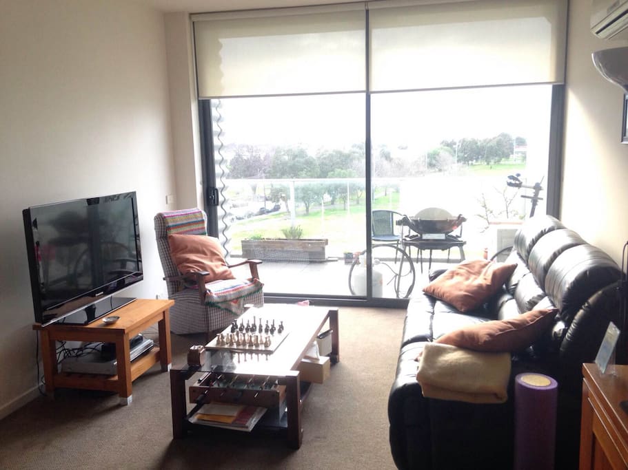 Living area, which opens out to the balcony (and barbeque)