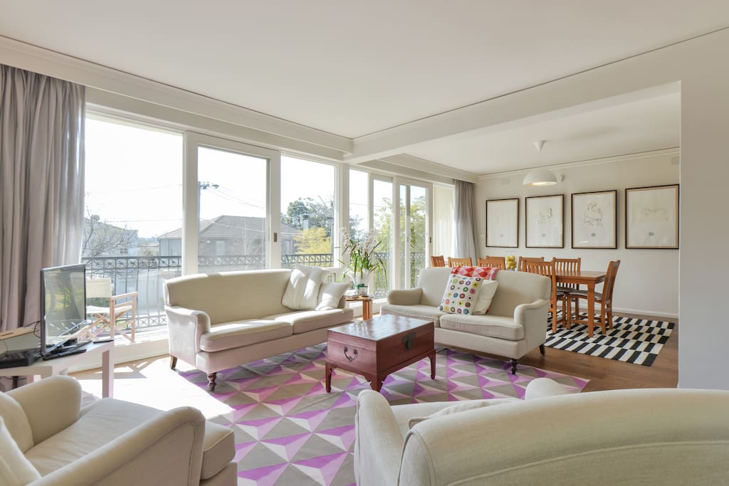 Light filled living/dining area perfect for relaxing, reading, planning the next day's adventure!
