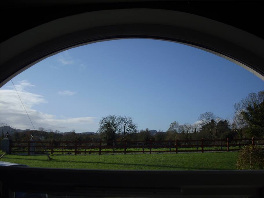 View of countryside from back of cottage