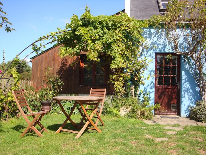 Little lodge in a wooded garden