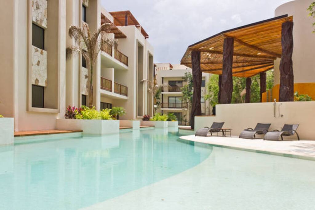 View of your sunny pool with shallow spot for kids!