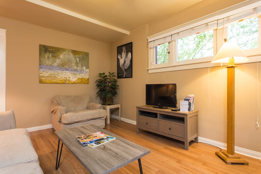 Living room with 32 inch TV with double sofa bed