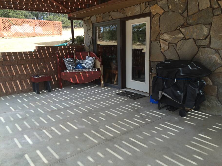 Patio and entrance along with grill available for use