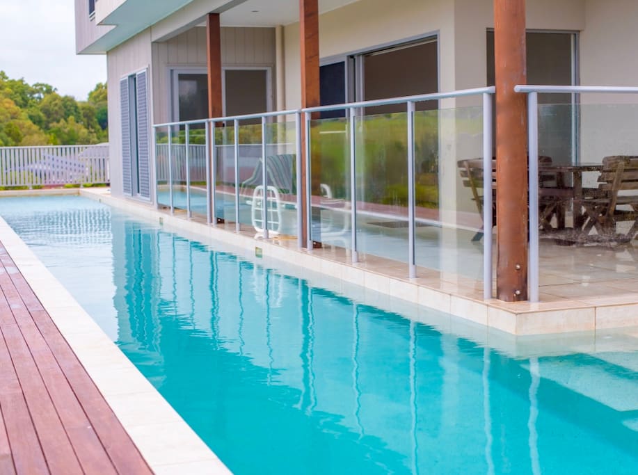 Self Contained Bottom Section of House Running Along Beside the 25m Lap Pool with large balcony.