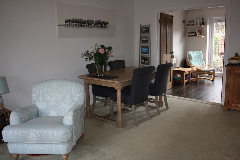 Dining area in the living room; easy access to the kitchen. Table seats 6 or can be extended to seat up to 10.