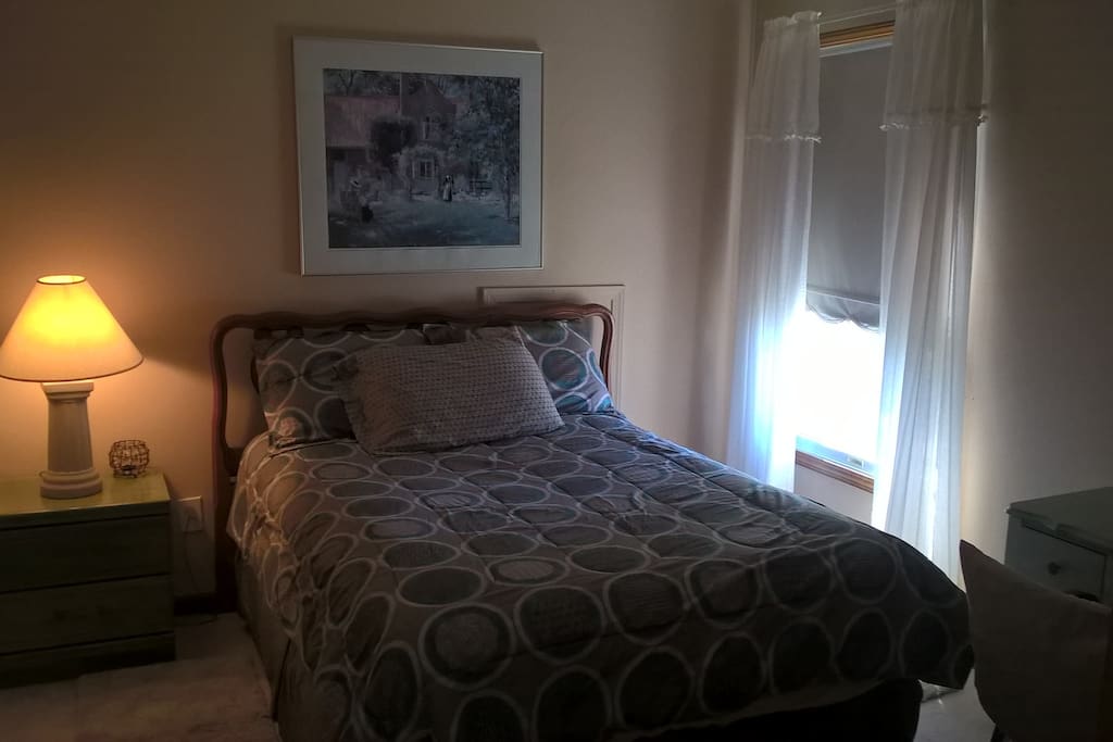Double bed with new Serta pillow-top mattress.