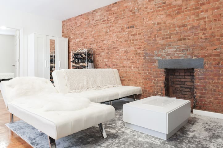 Cozy Room with Exposed Bricks