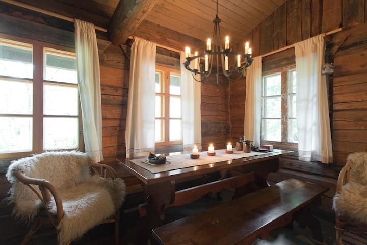 A cosy log cabin with a sauna