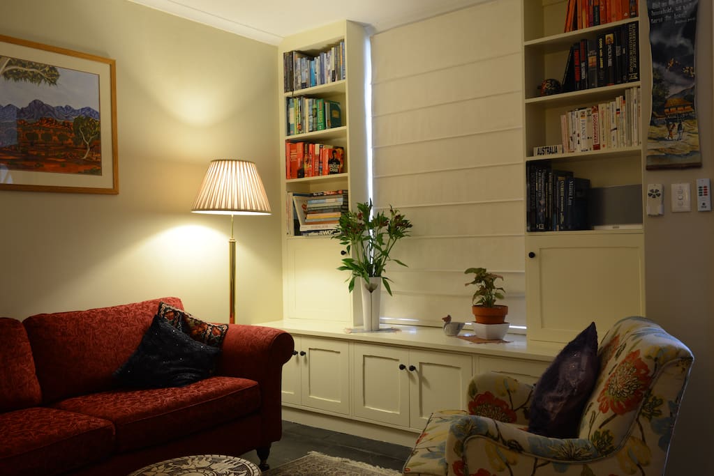Peace and quiet in the shared living room. Sit and read while watching people walk past through the window