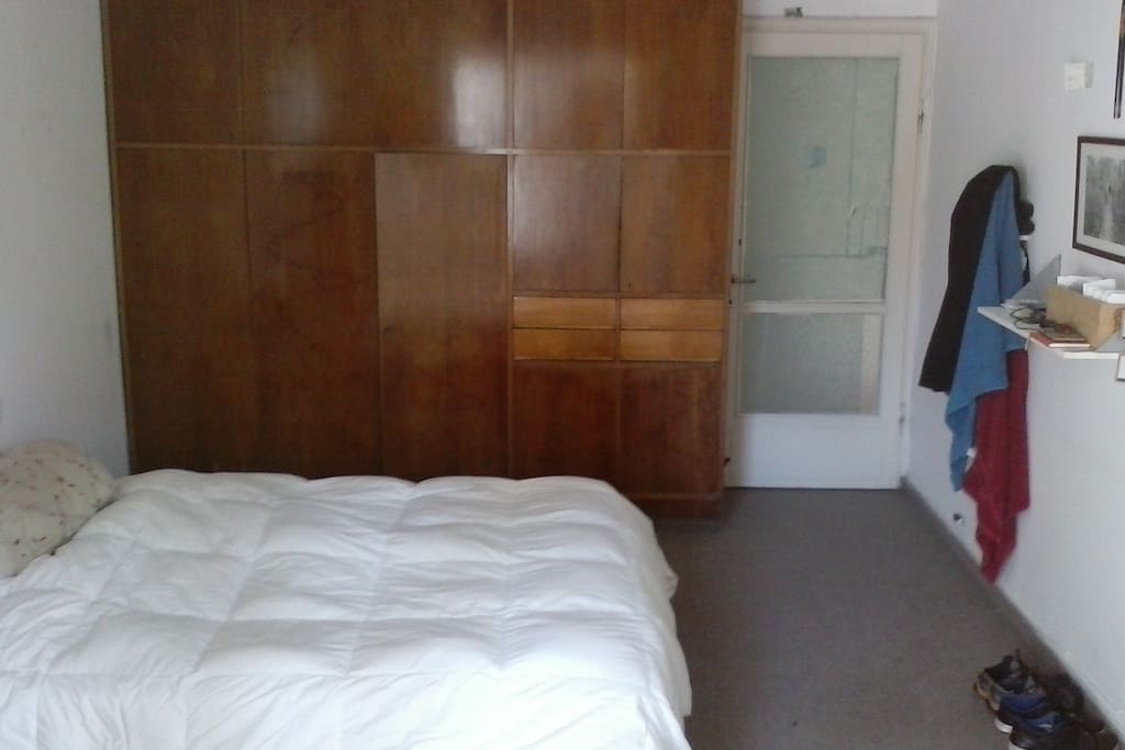 The bedroom with built in wardrobe.