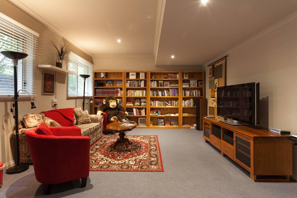 Lounge room with 50 inch Plasma and DVD player, folding divan