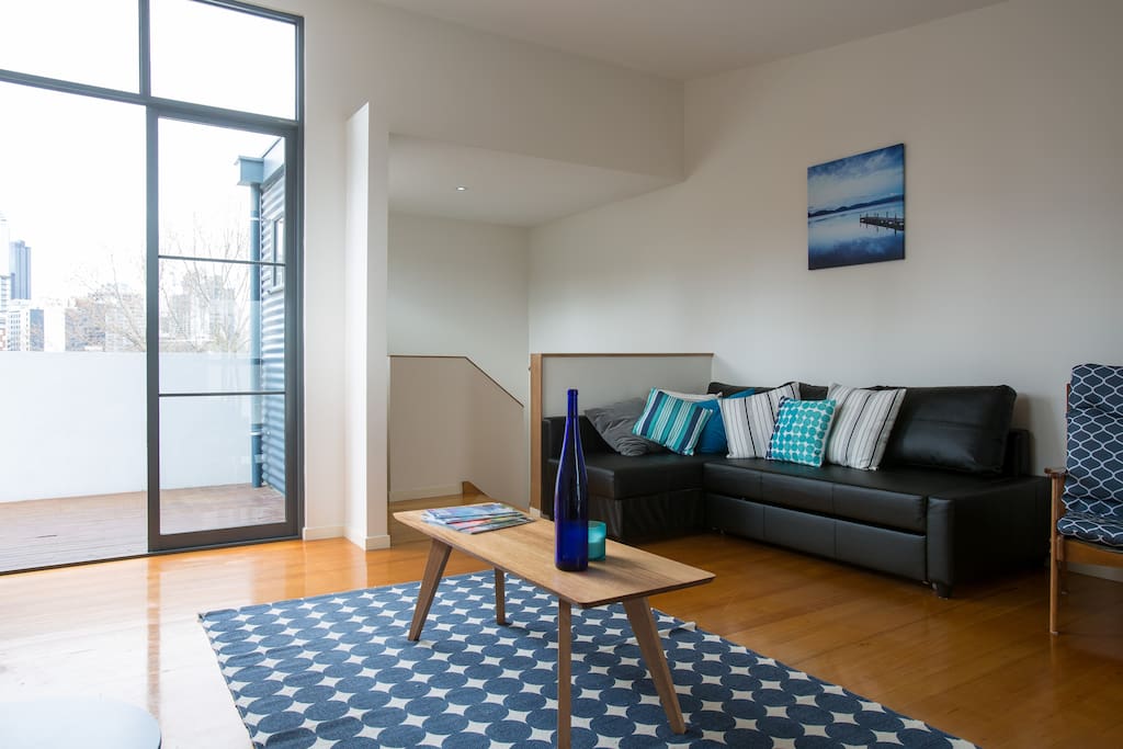 Large retreat which opens out onto the rooftop deck