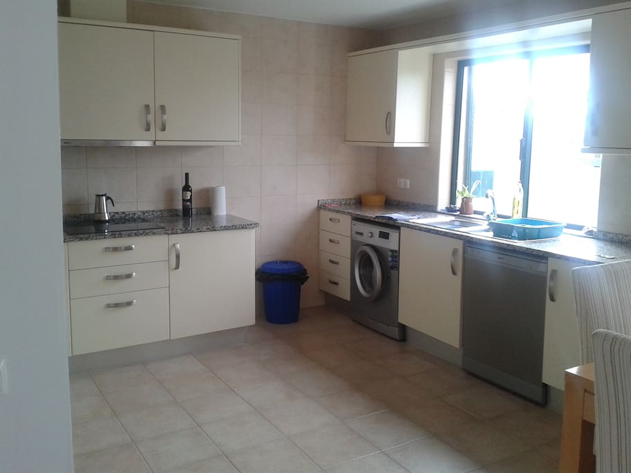 kitchen with washing machine, dishwasher etc everything you need
