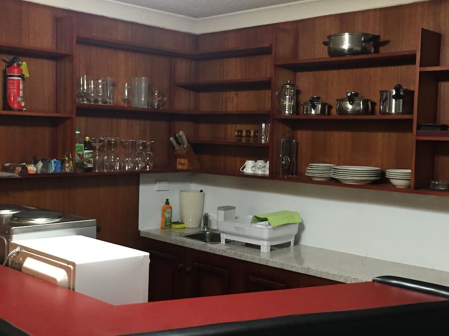Newly installed Kitchenette with stove, microwave and complete cooking utensils